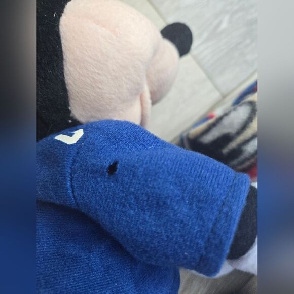 Giants blanket with Disney's Mickey plush hugging it - Picture 4 of 12